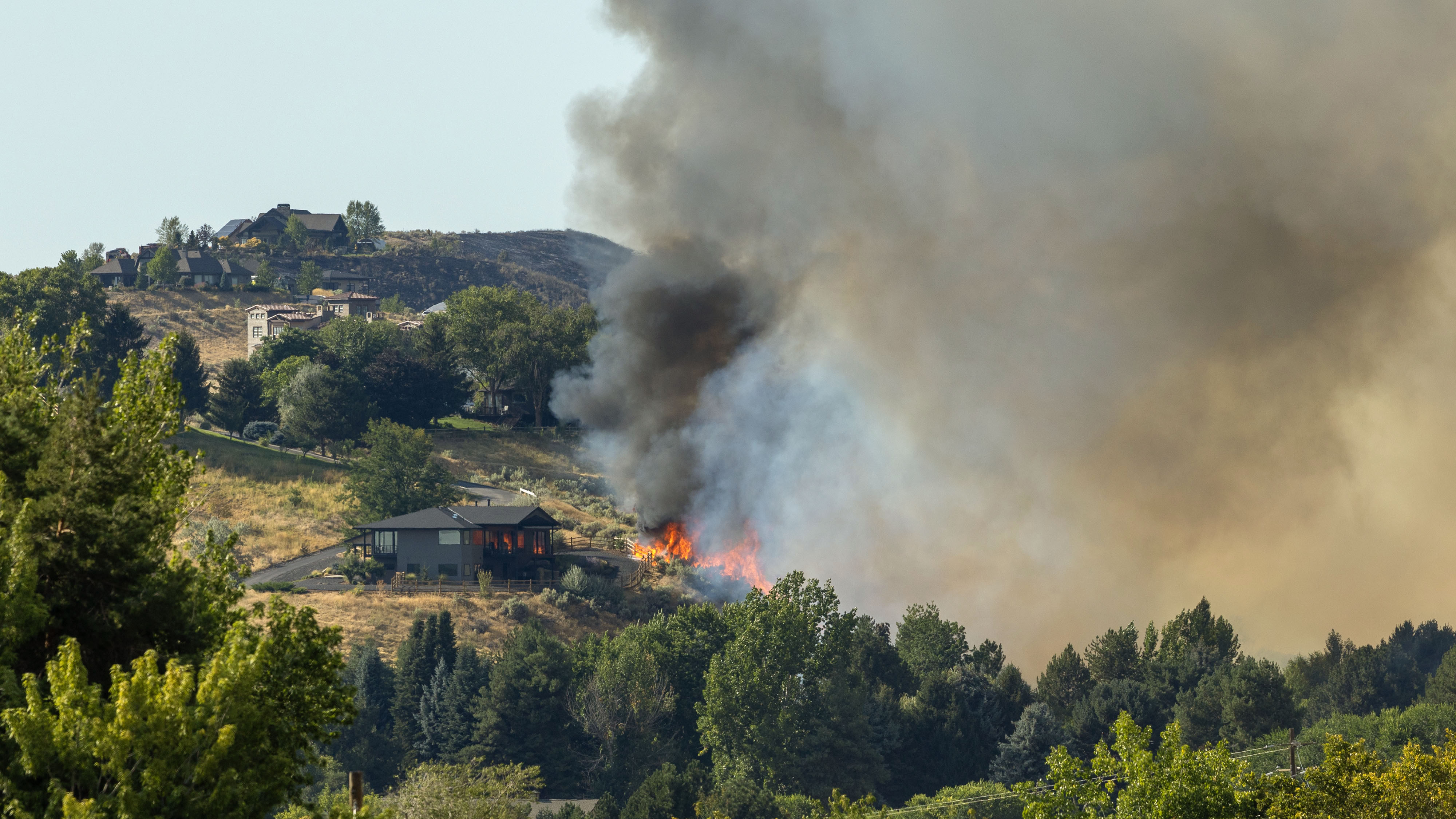 Eagle Wildfire Threatens Homes